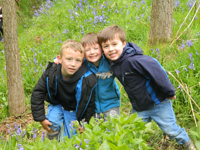 Children playing in forest